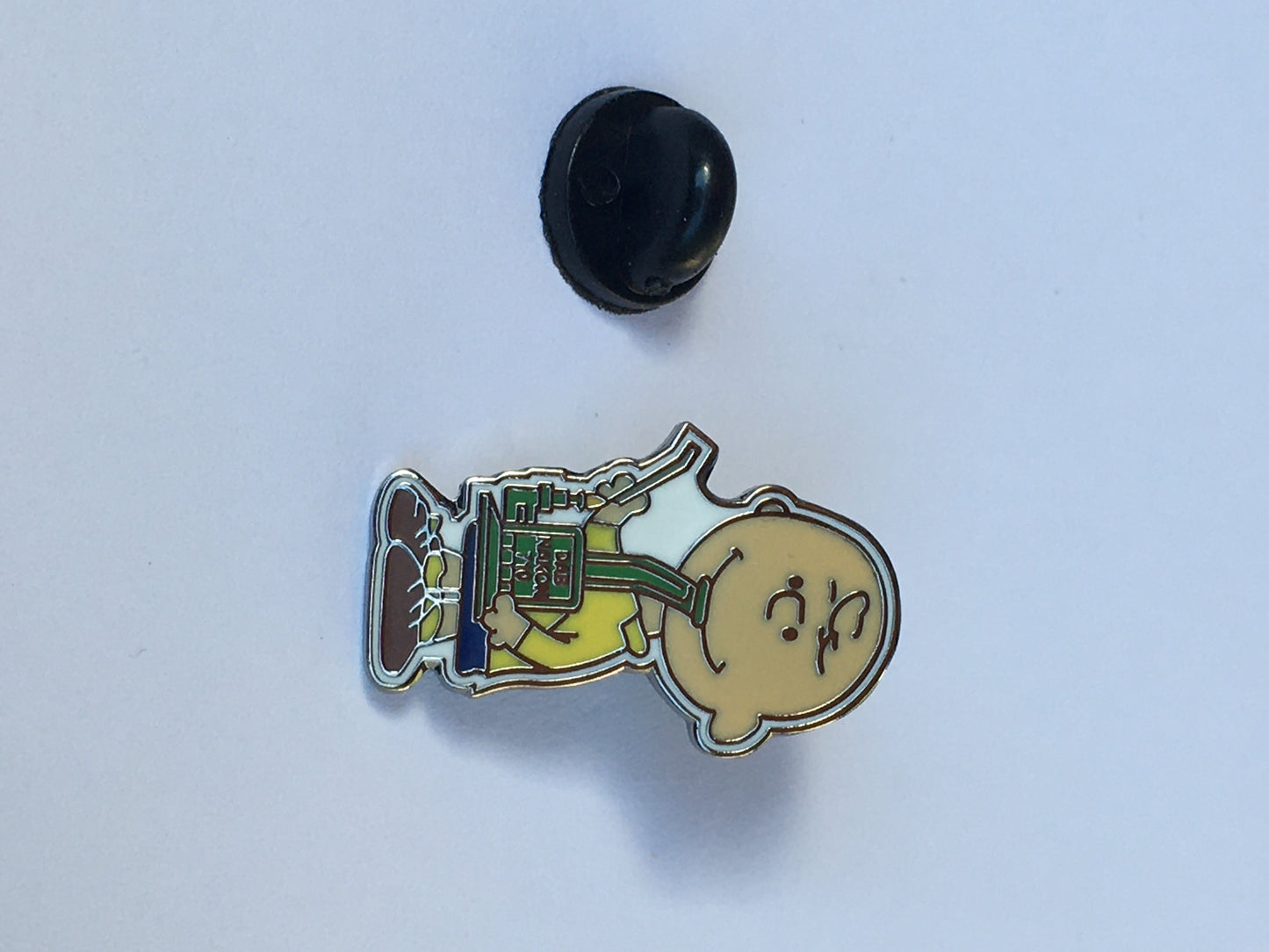 Charlie Dabs Brown Pin