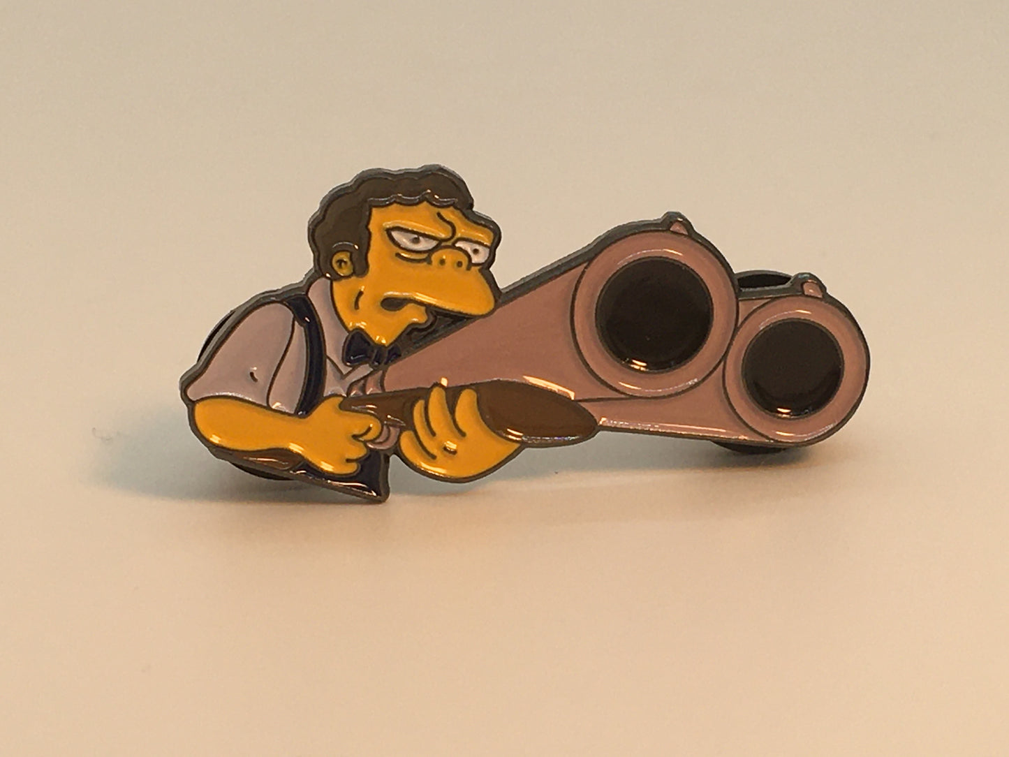 Moe Szyslak Shotgun Pin