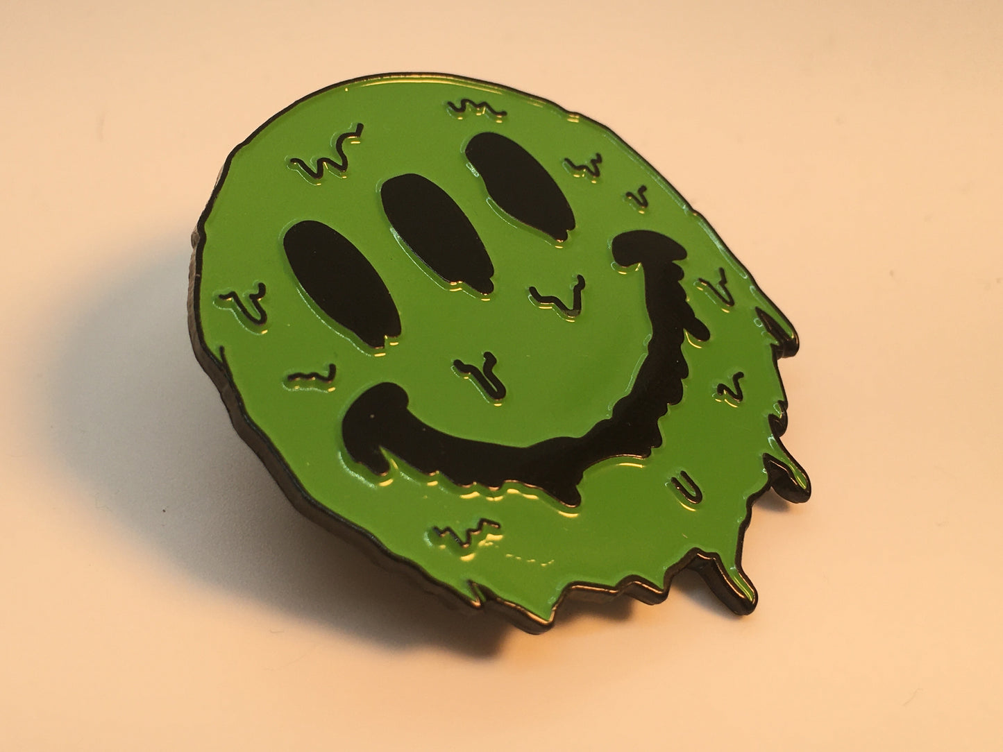3 Eyed Green Smiley Face Melting Pin