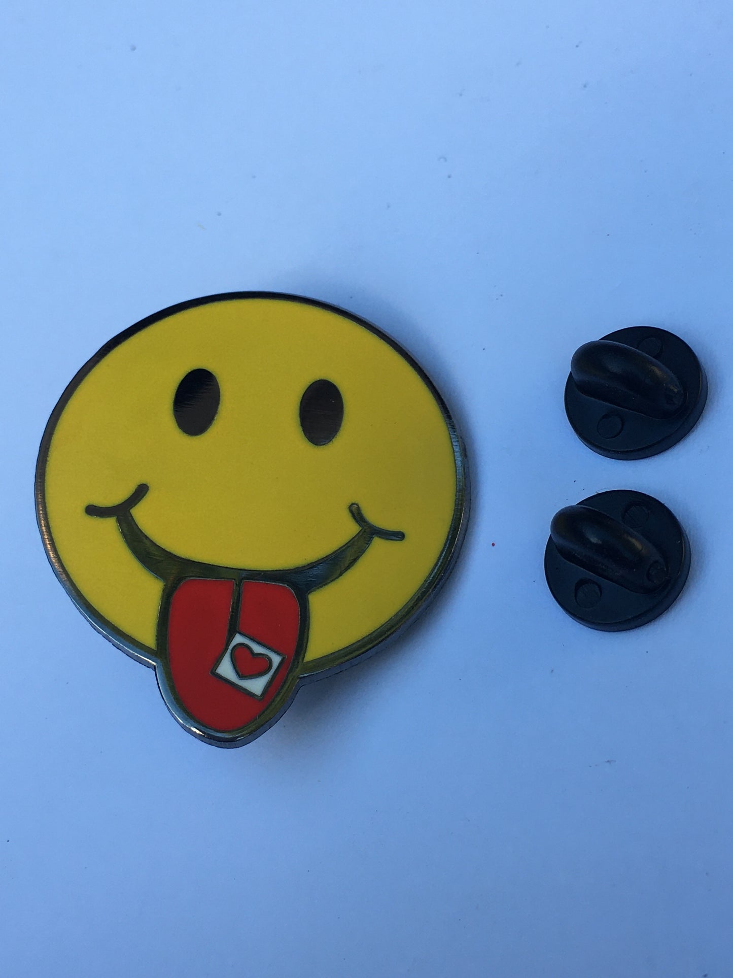 Smiley Face Tab on Tongue Pin