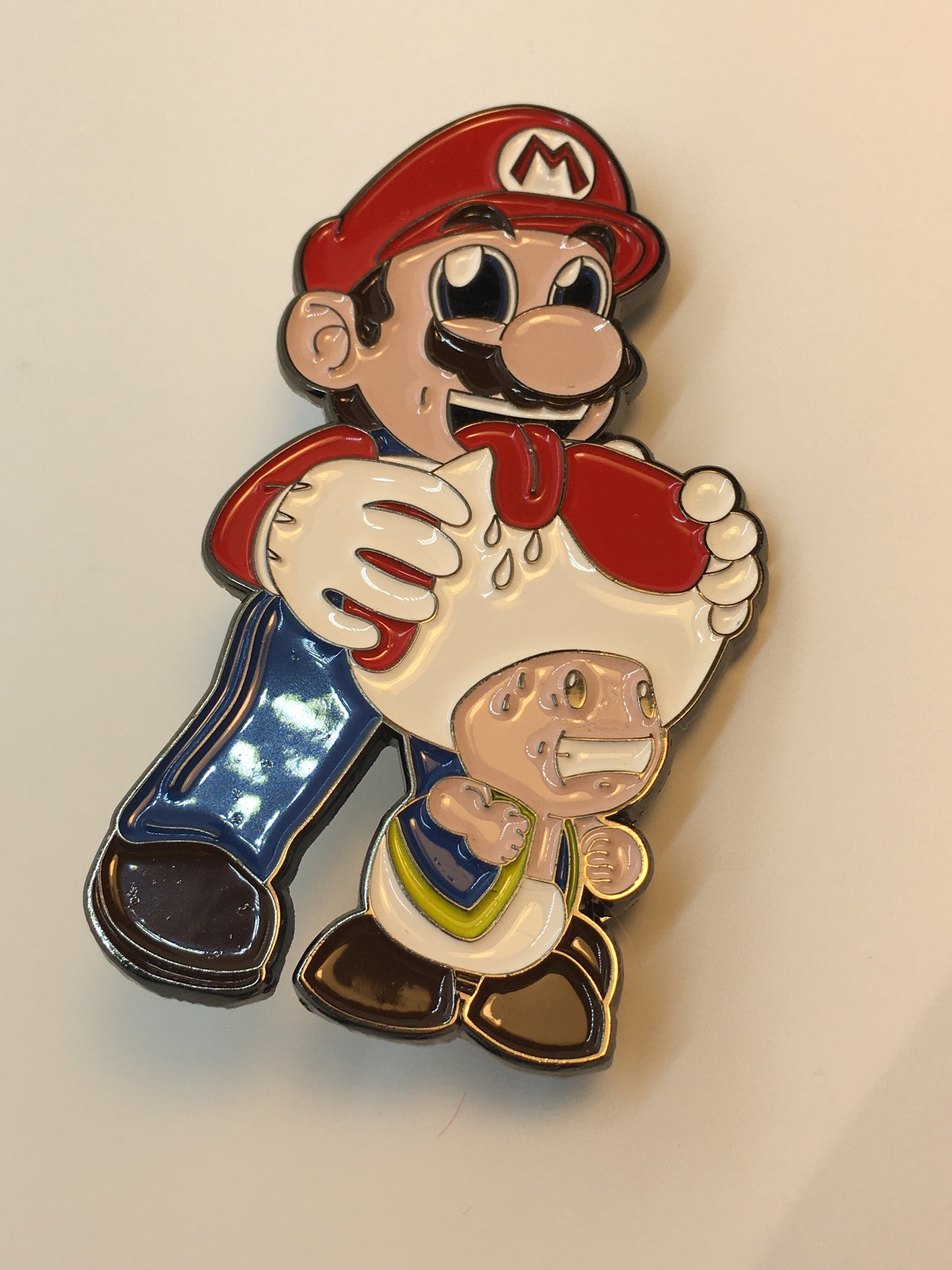 Toad Licking Mario Pin