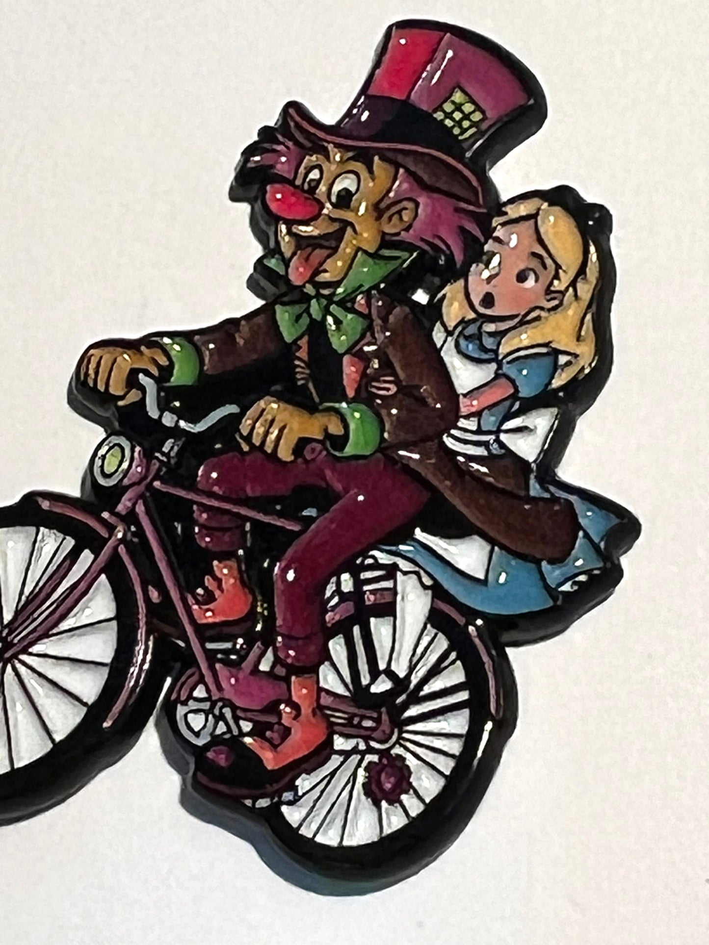 Mad Hatter Bike Ride tab on tongue w Alice Pin