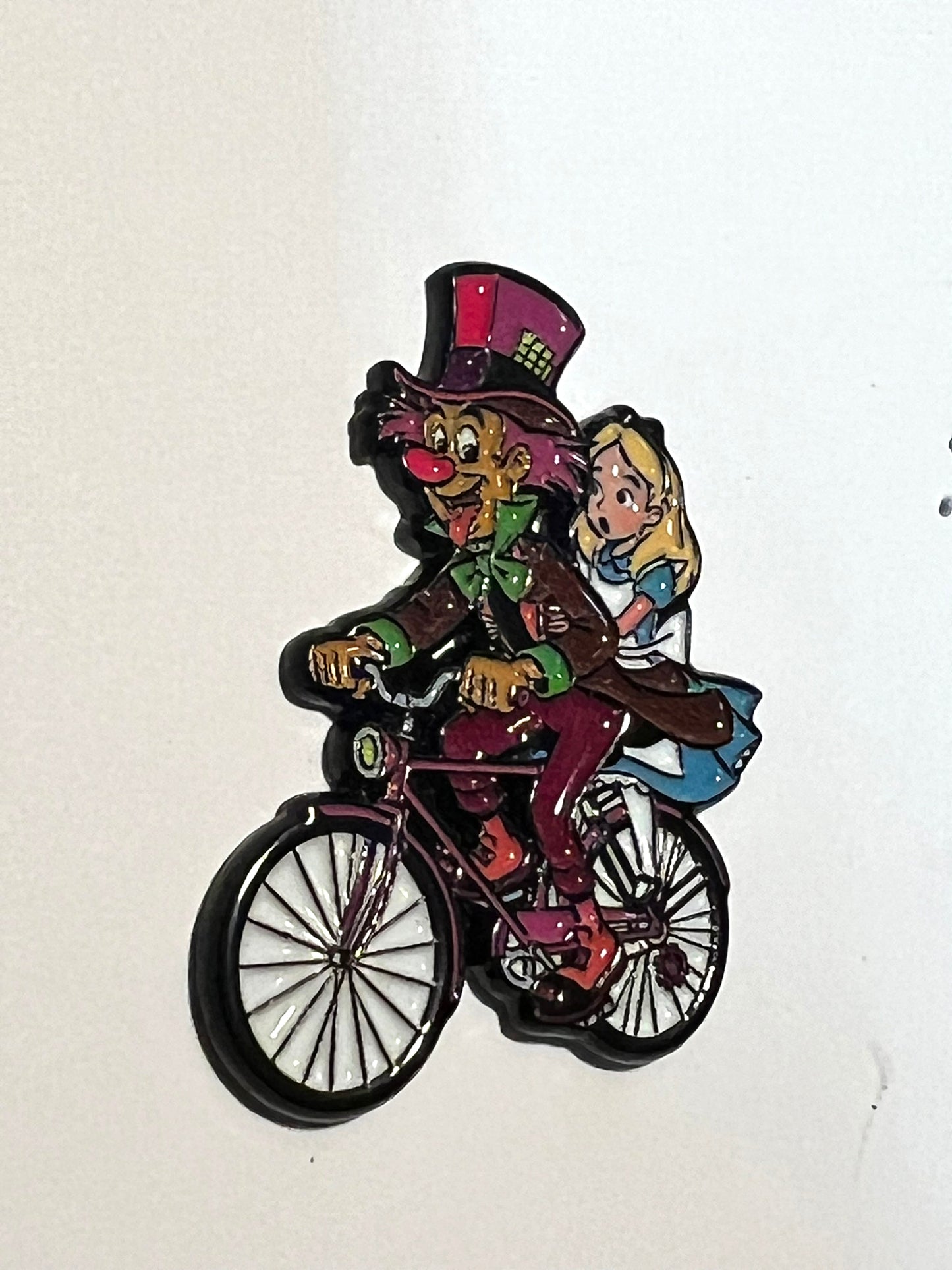 Mad Hatter Bike Ride tab on tongue w Alice Pin